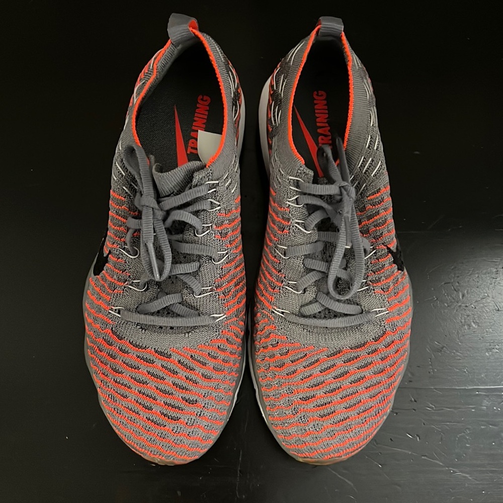 Women’s NIKE ZOOM SIZE 6.5, slightly used, grey and orange.